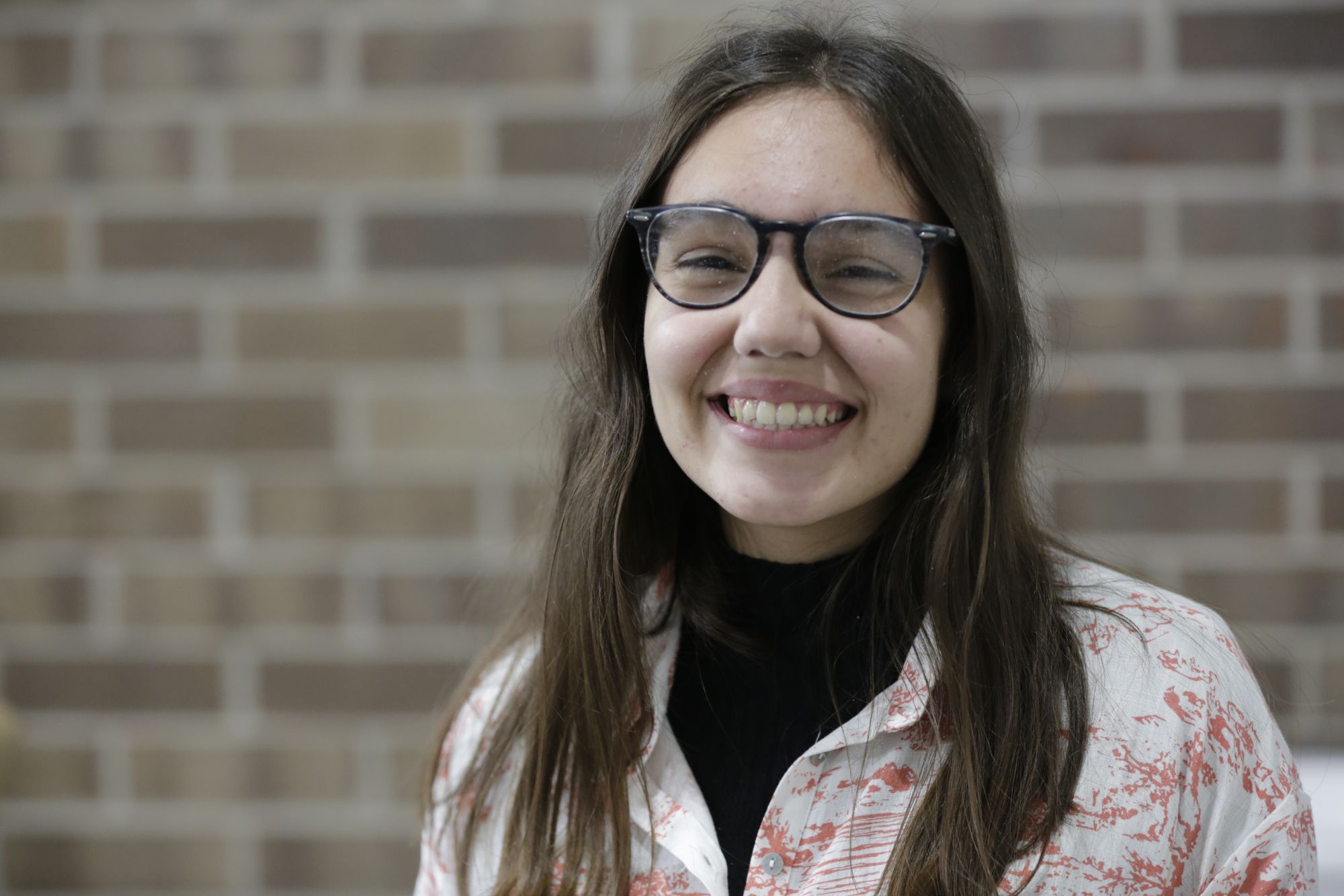 Happy patient after clear aligner treatment at Norton Orthodontics Cape Coral
